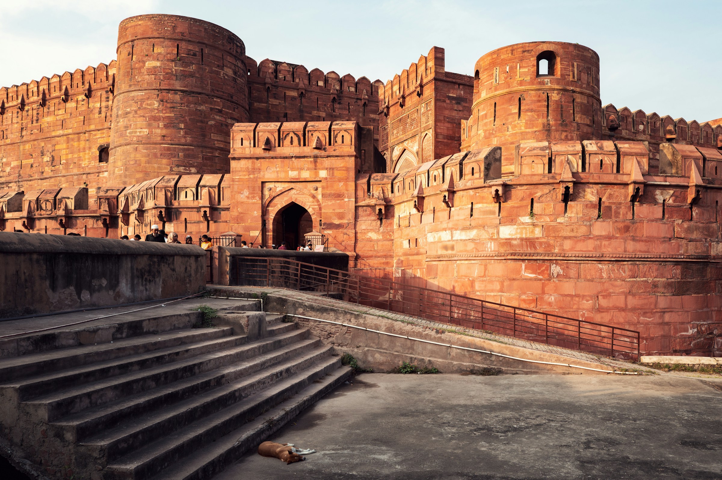 Massive red sandstone fort with intricate architectural details, Agra Fort