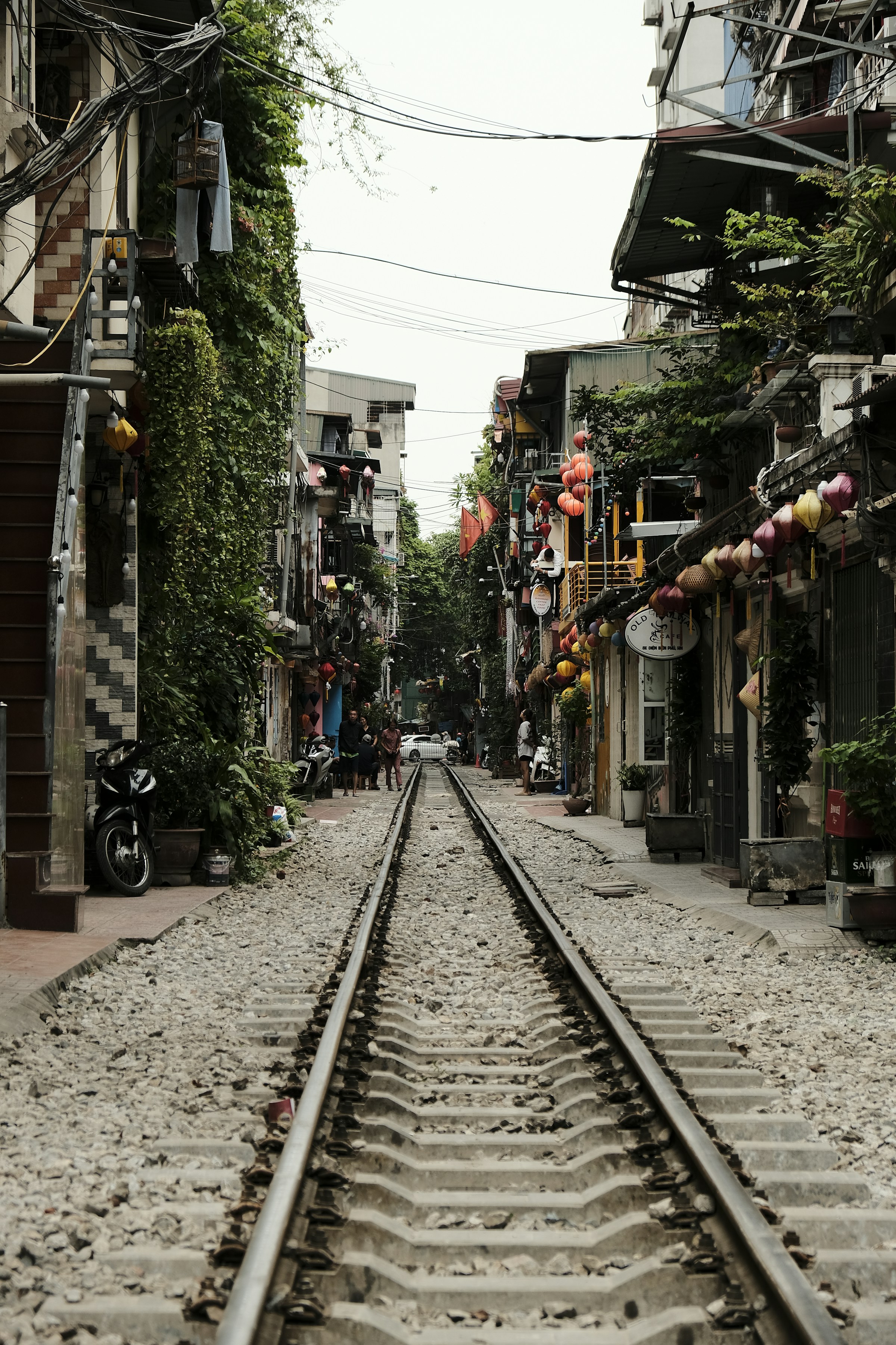 Train track running through a narrow alley, Hanoi Train Street