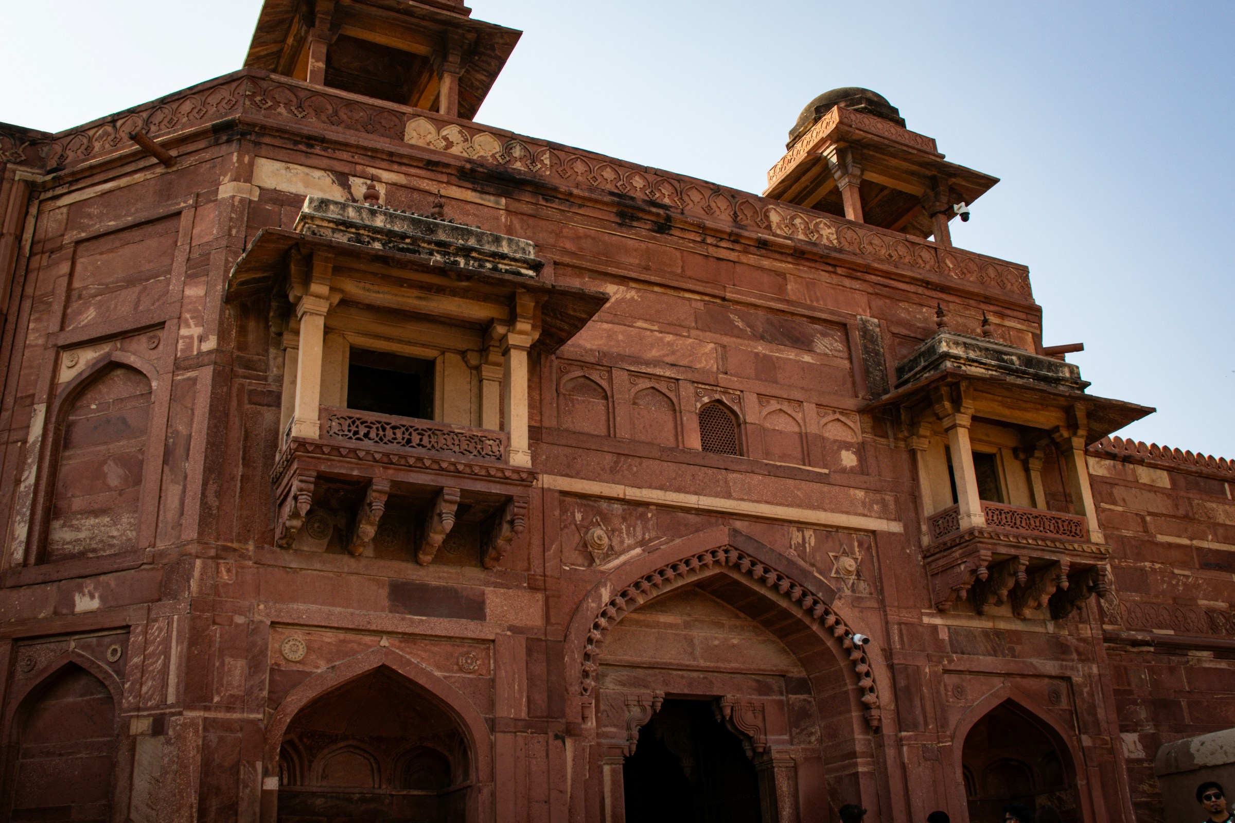 Red fort building with detailed traditional architecture, Fatehpur Sikri