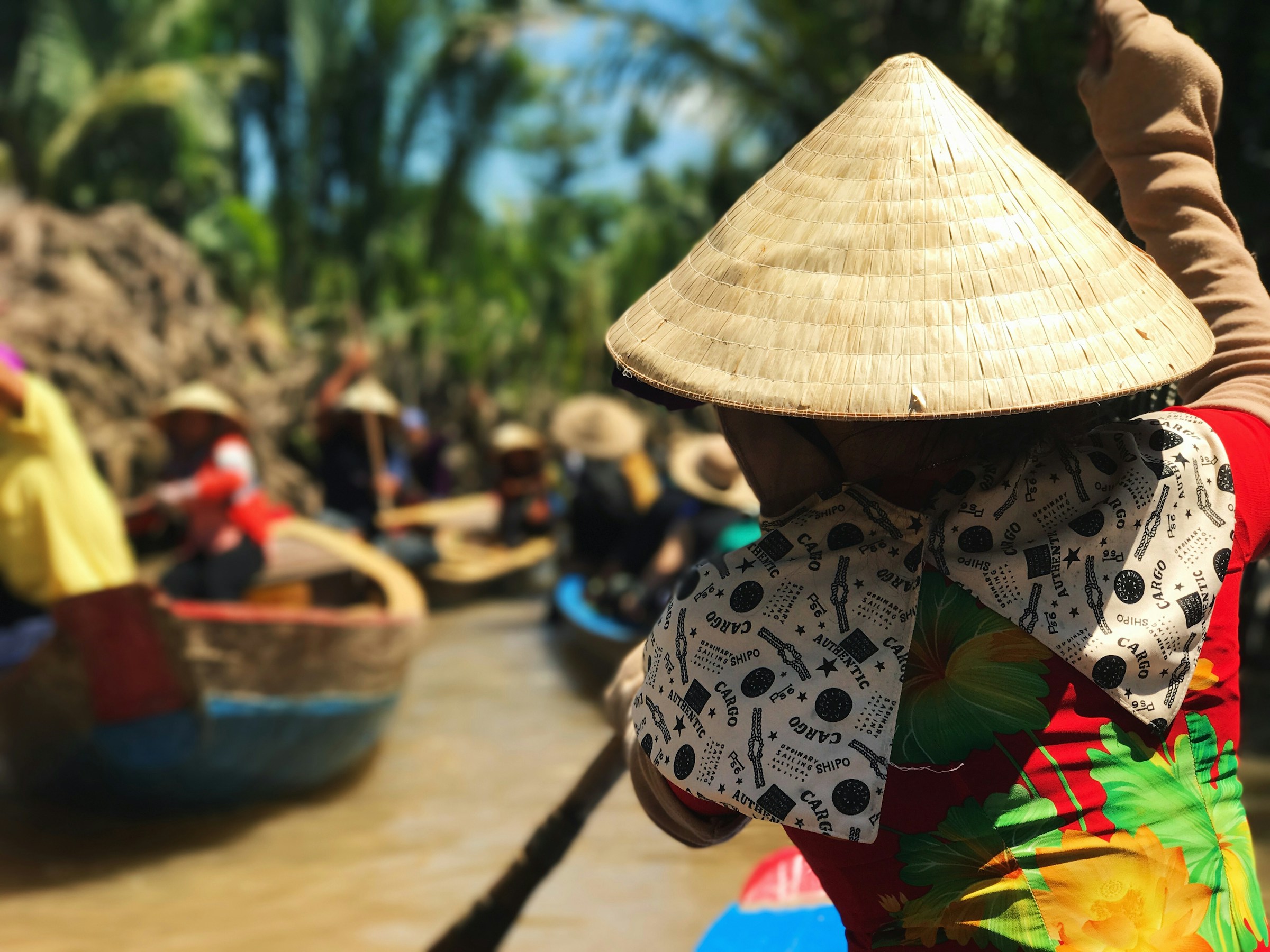 People aboard a boat, Mekong Delta