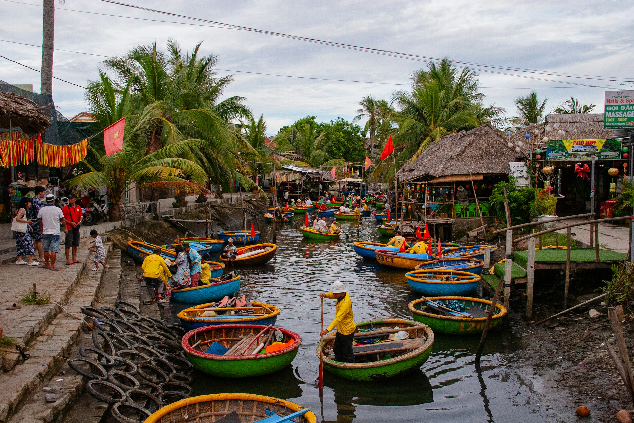 Round basket boats in a canal, Cam Thanh Coconut Forest