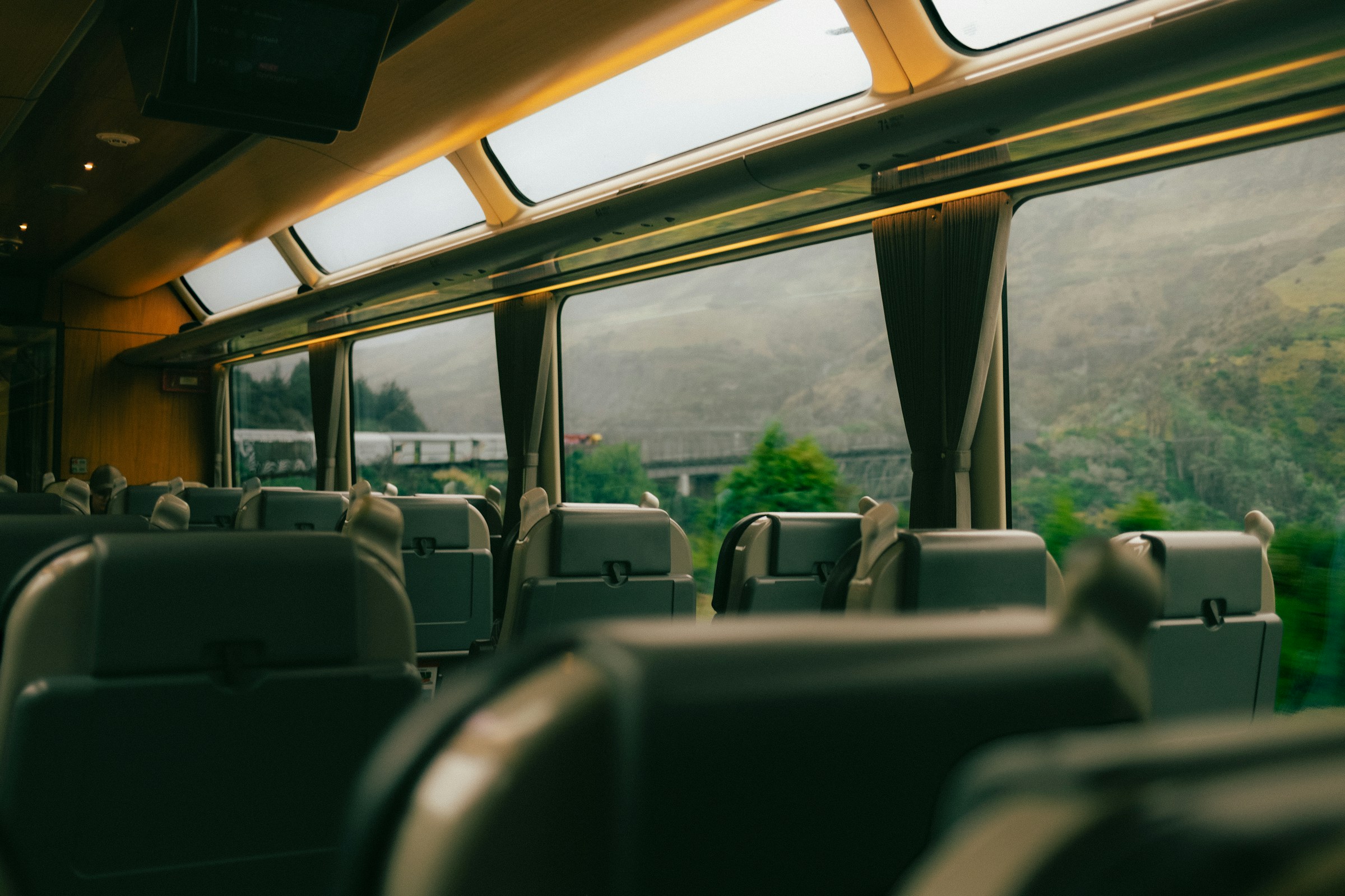 Empty train car with mountain view