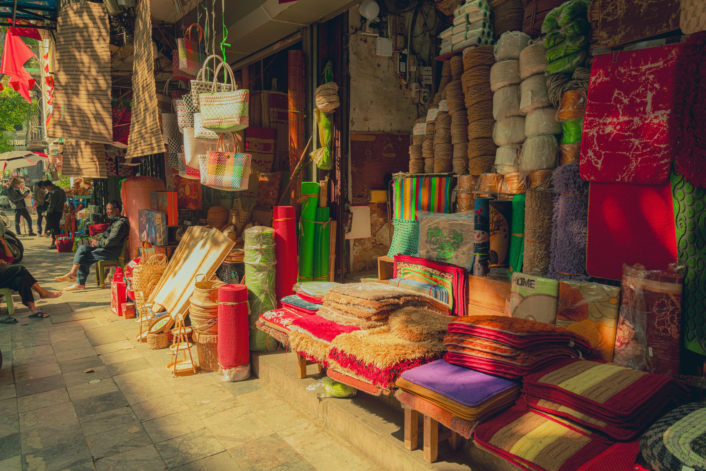 Street market stall with colourful textiles