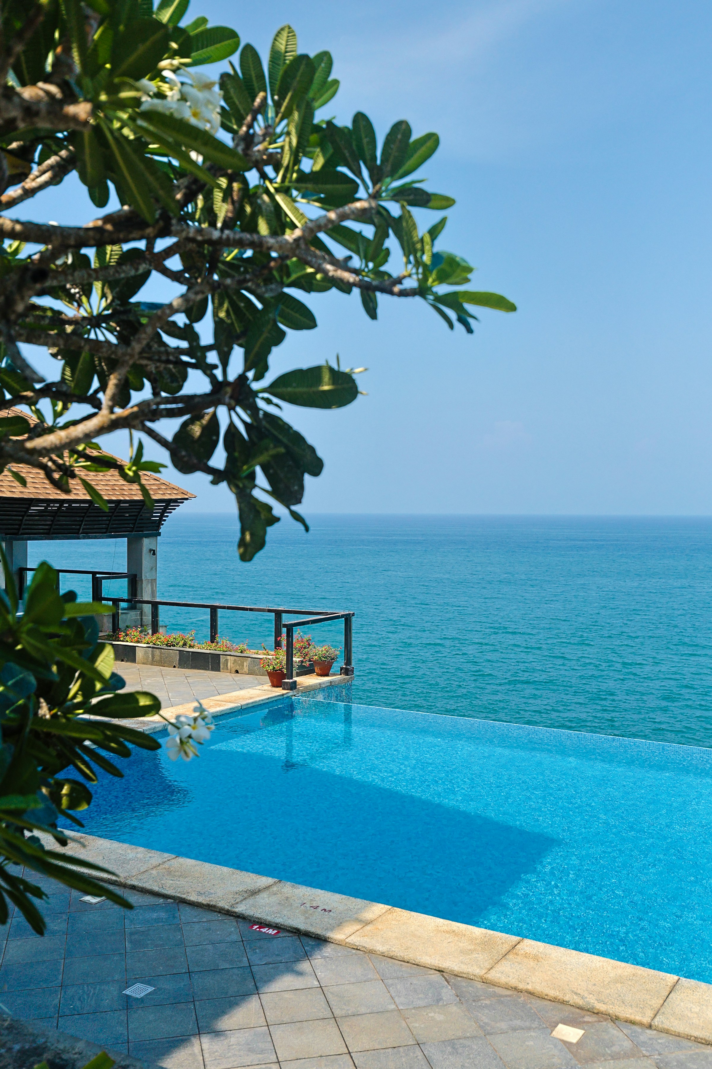 Large swimming pool with a view of the ocean