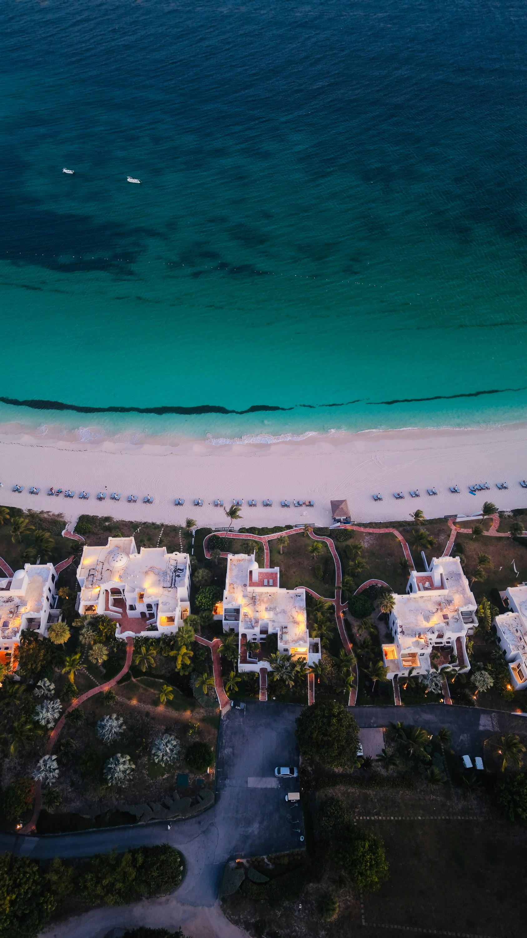 Tropical resort villas at dusk