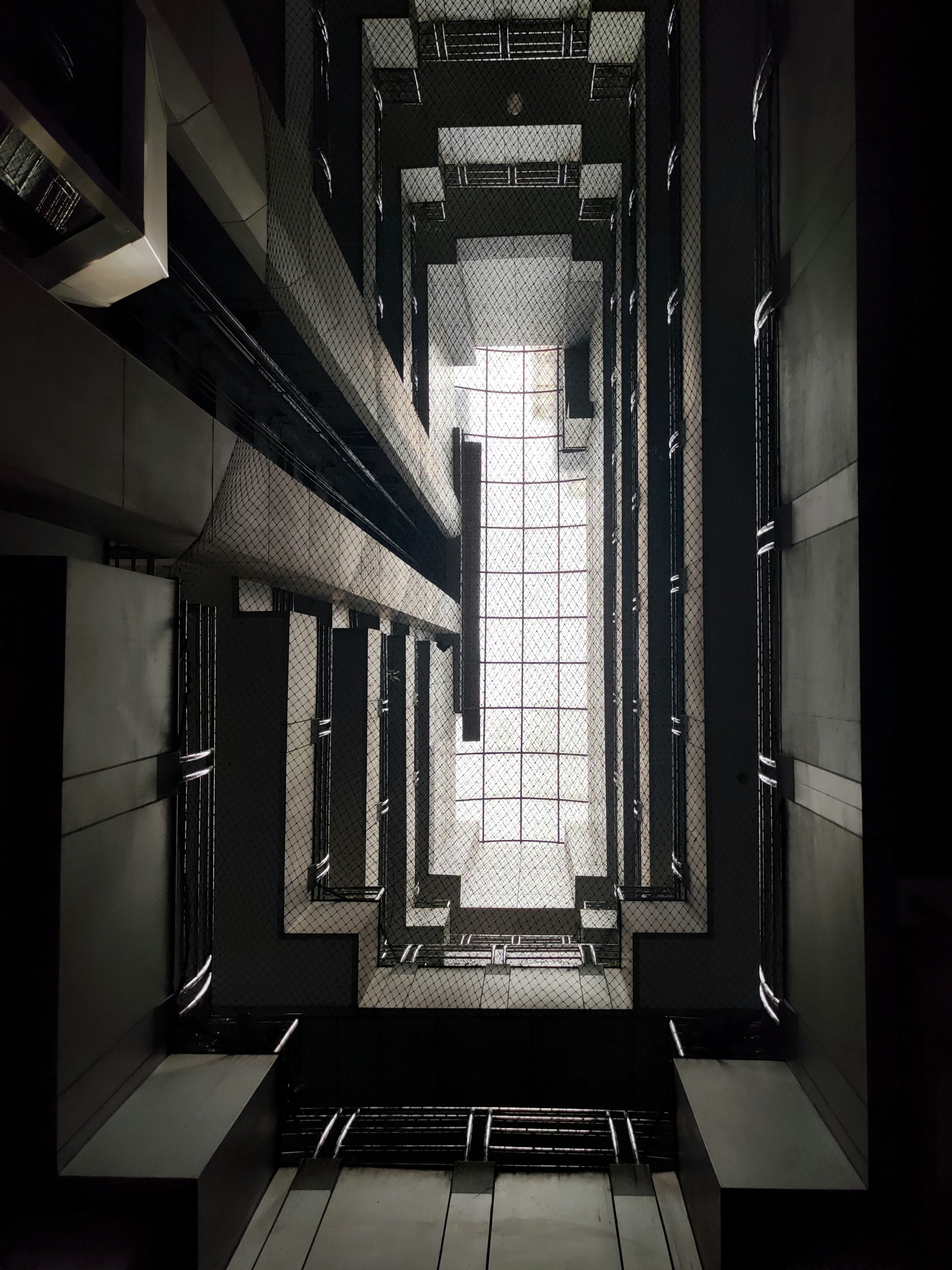 Hallway with black and white lighting, hotel interior