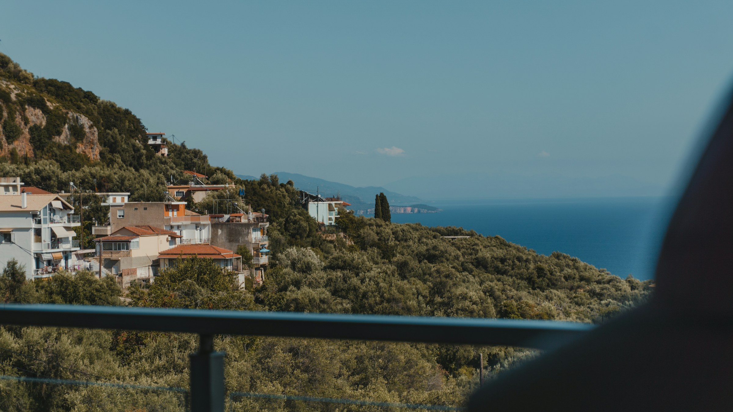 Coastal village on a hillside overlooking the sea