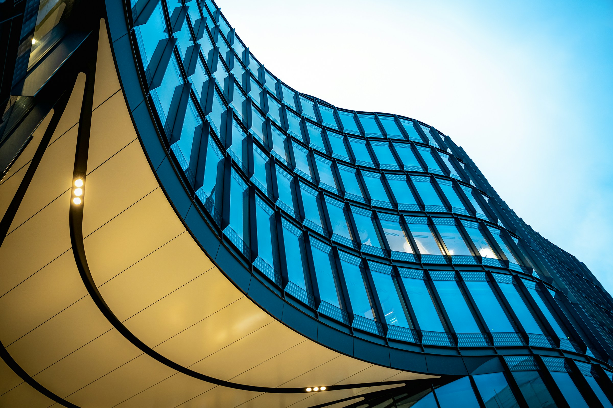 Curved modern building against the sky