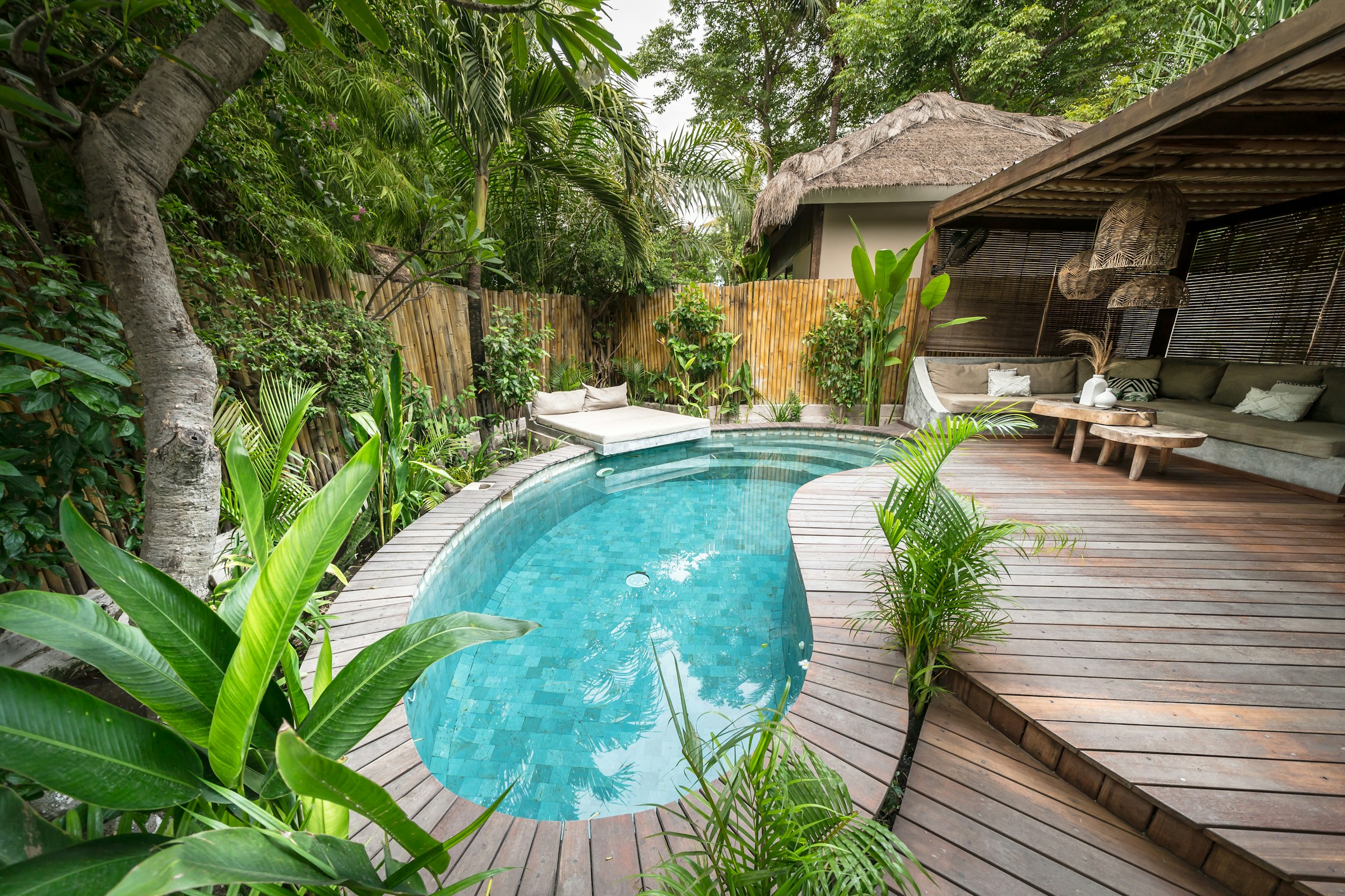 Tropical villa with private pool and outdoor seating